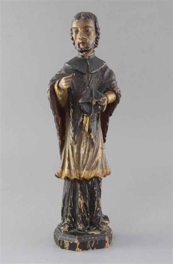 A 15th century German polychrome on wood figure of St. Nepomuk, 15in.